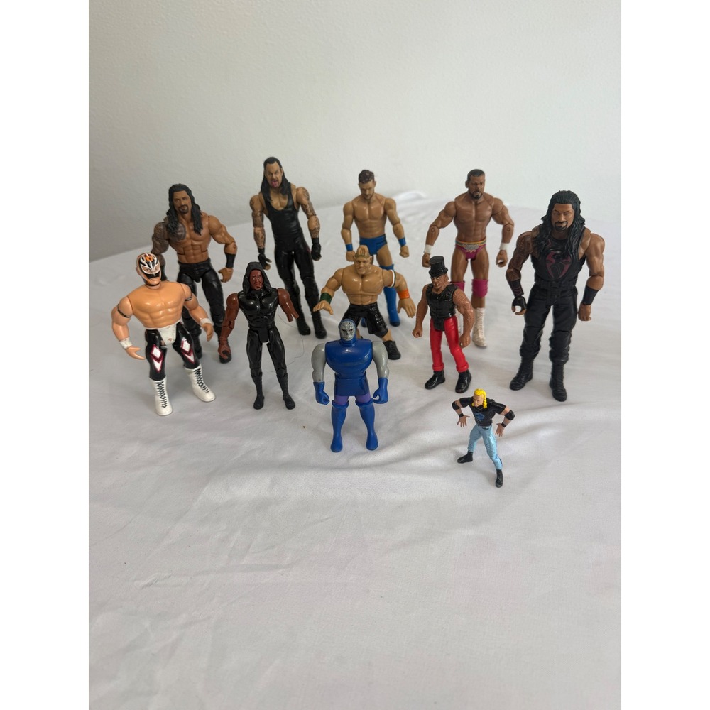 WWE Wrestling Action Figure Lot Roman Reigns Undertaker Darkseid Sabretooth 12pc